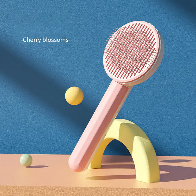 Escova de cabelo autolimpante